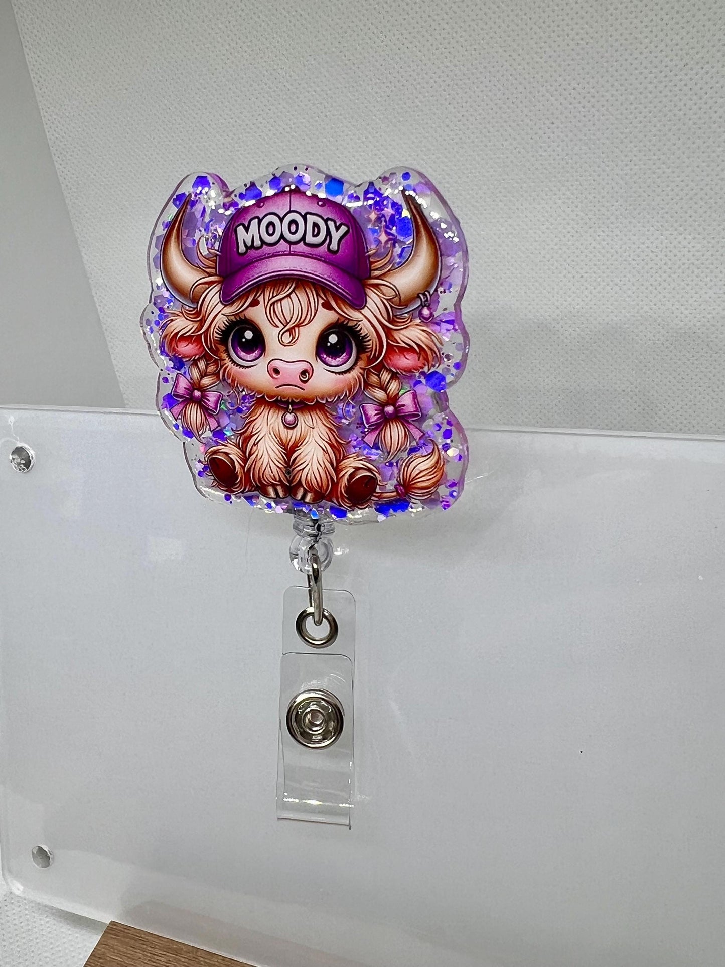 Highland Cow Badge Reel – Glittery 'Moody' Purple Hat Design with Retractable ID Holder