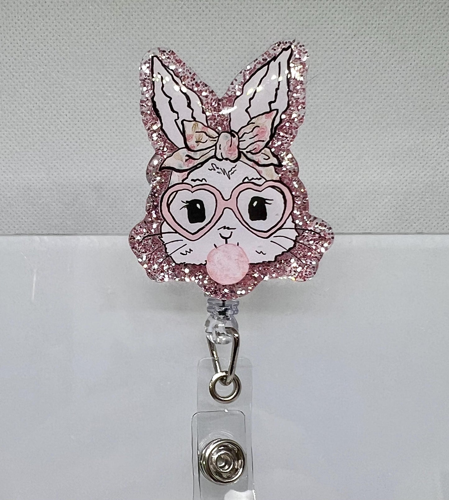 Glitter Bunny Badge Reel – Heart Glasses, Pink Bow, and Acrylic Design for Nurses and Medical Professionals