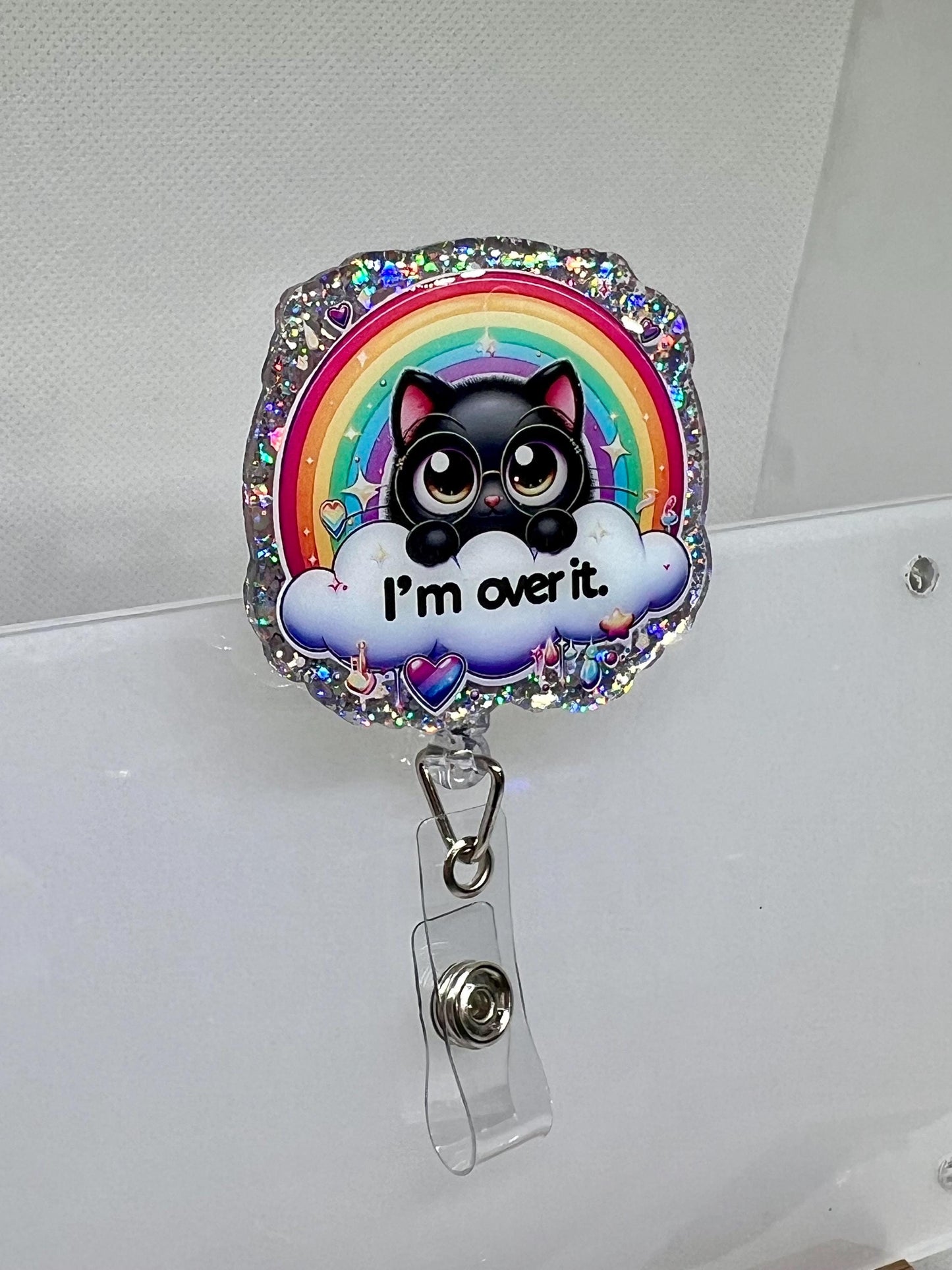Cute Cat Badge Reel – 'I'm Over It' Rainbow and Cloud Design for Fun and Whimsical ID Holder