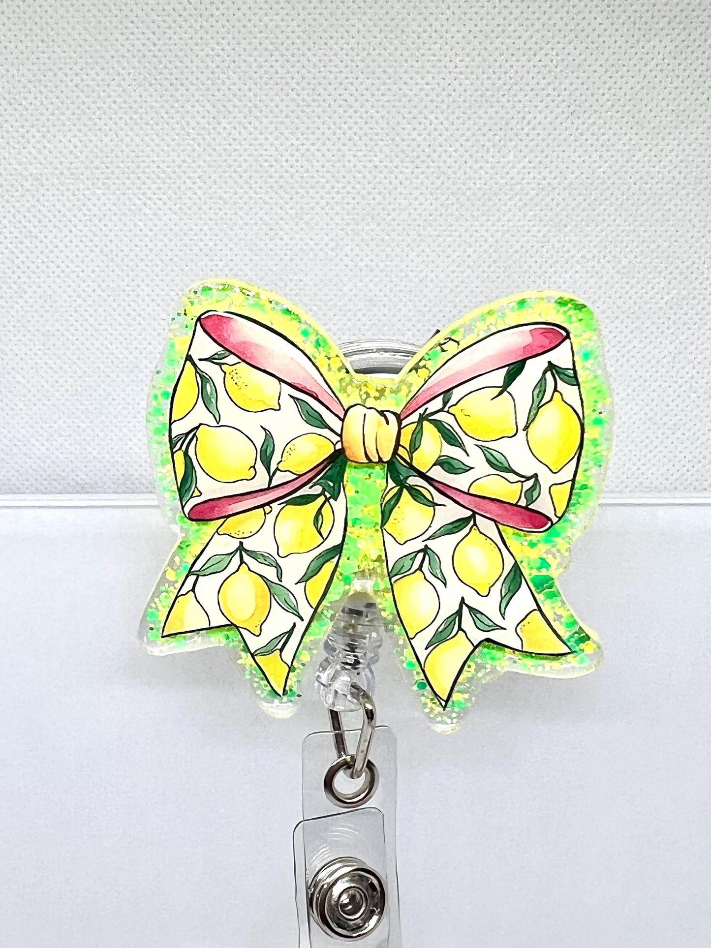 Lemon Bow Badge Reel – Glittery Yellow and Green Design with Red Ribbon Accent for ID Holders