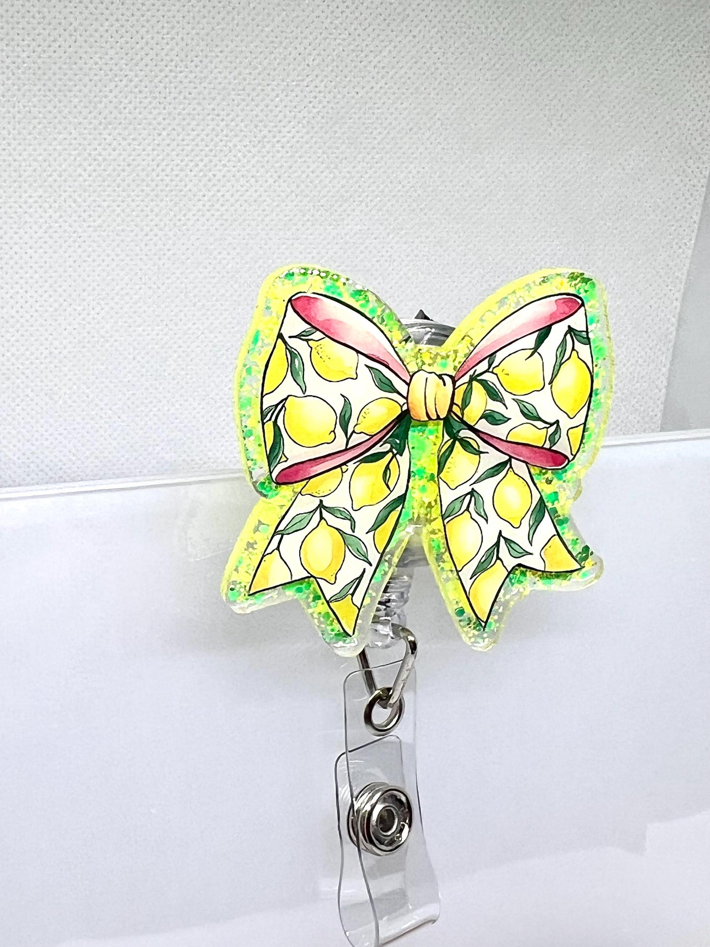 Lemon Bow Badge Reel – Glittery Yellow and Green Design with Red Ribbon Accent for ID Holders
