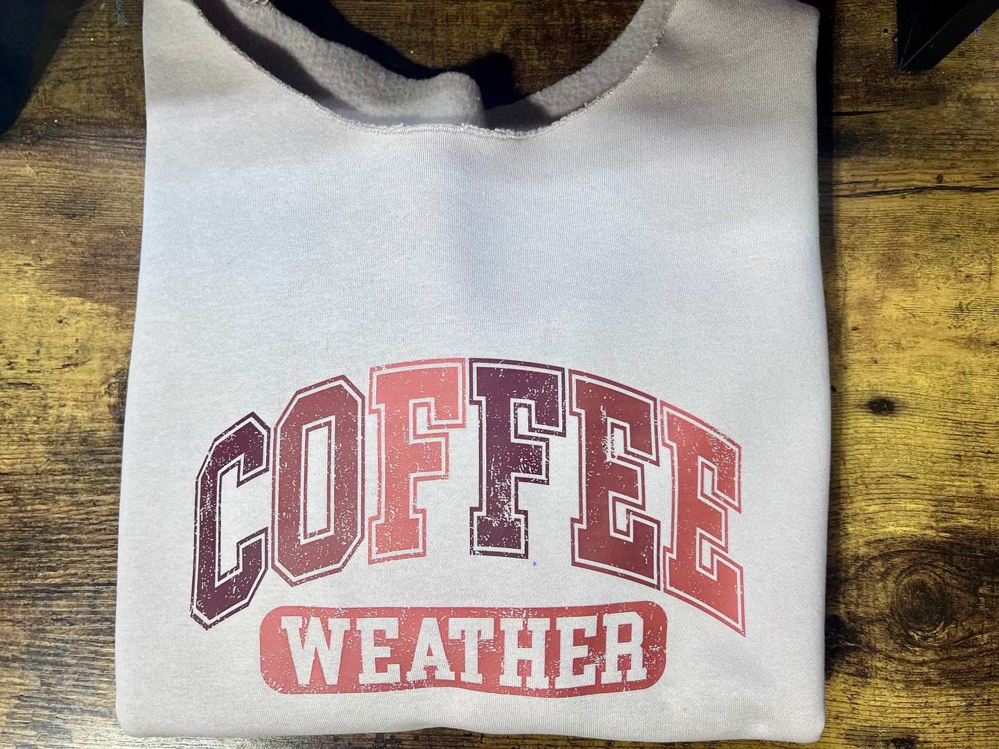 Distressed retro Coffee Weather DTF transfer in warm beige and brown tones, ready-to-press heat transfer for coffee-themed apparel.