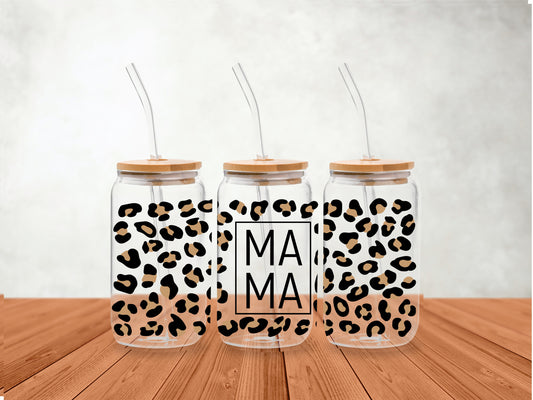Mockup of the Mama Leopard Cheetah UV DTF wrap applied to three frosted glass cans with bamboo lids and straws