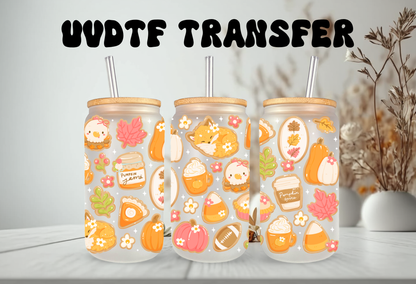 16oz can glass wrap featuring a cozy fall aesthetic design with sleeping foxes, pumpkin spice lattes, pumpkin jam jars, and pie slices on a clear background.