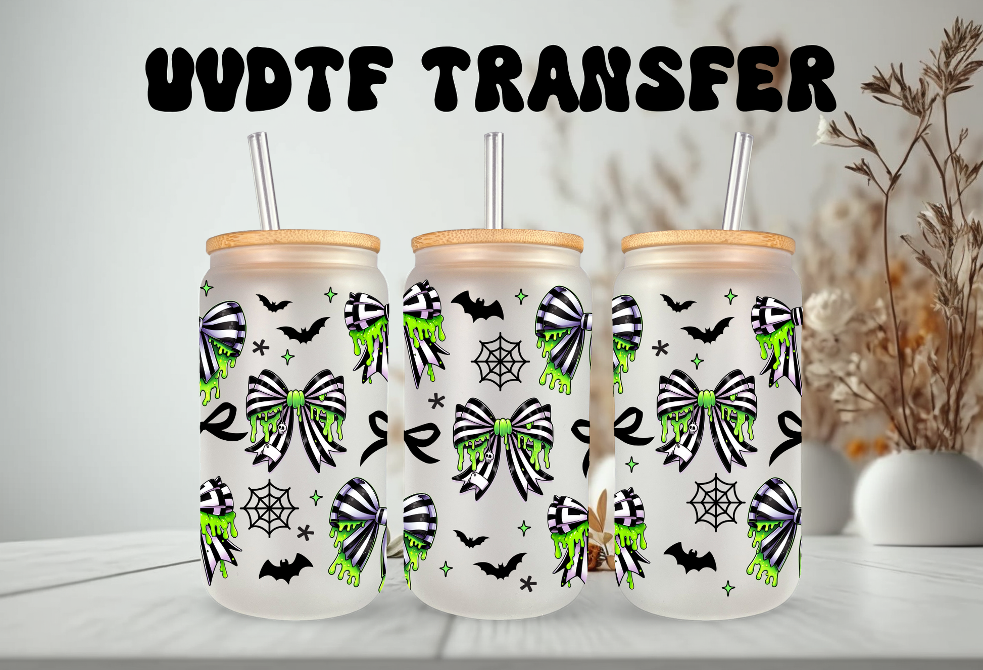 Spooky coquette UV DTF wrap featuring neon green slime drips, black and green spiderweb bows, bats, and cobwebs for 16oz glass can tumblers.