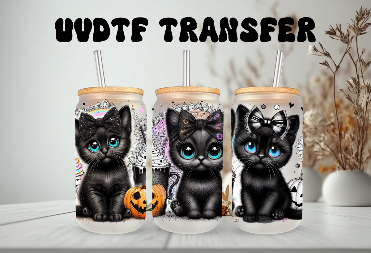 16oz frosted glass tumbler mockup featuring three adorable black kittens with big glossy eyes, witch hats, and jack-o-lanterns on a clear background.