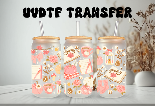 Cozy pink bookish autumn UV DTF wrap featuring reading glasses, open books, pink pumpkins, coffee mugs, and autumn foliage for 16oz glass can tumblers.