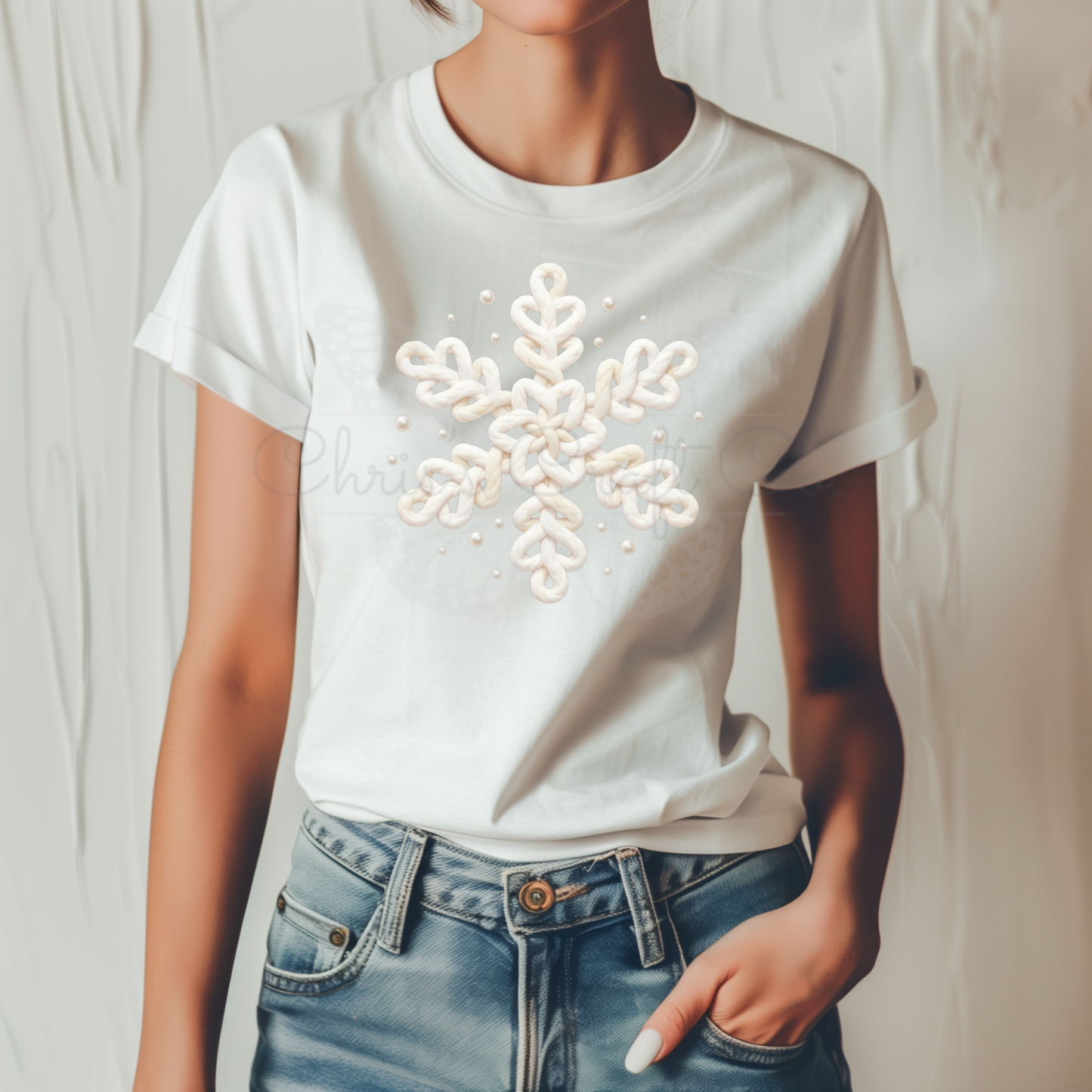 Ready-to-press DTF transfer featuring faux yarn snowflake, printed on clear film for heat application.