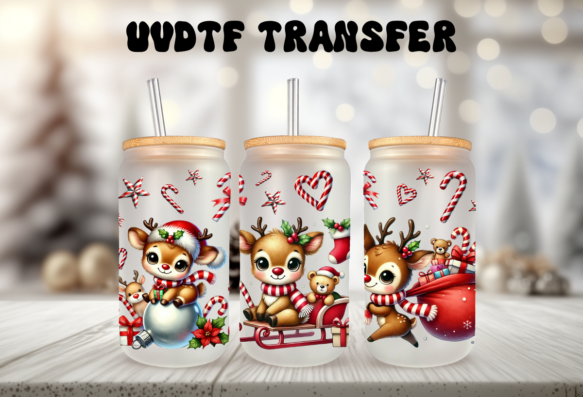 Mockup Three 16oz glass can tumblers with bamboo lids and straws displaying colorful holiday reindeer UVDTF wrap designs