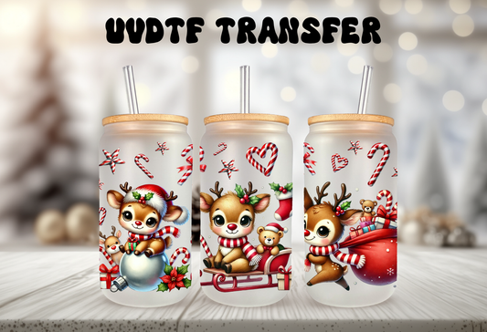 Mockup Three 16oz glass can tumblers with bamboo lids and straws displaying colorful holiday reindeer UVDTF wrap designs