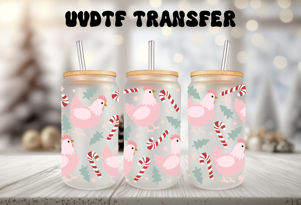 mockup of Three 16oz glass can tumblers with bamboo lids displaying pink Christmas chicken hen UVDTF wrap designs