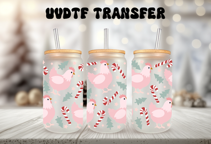 mockup of Three 16oz glass can tumblers with bamboo lids displaying pink Christmas chicken hen UVDTF wrap designs