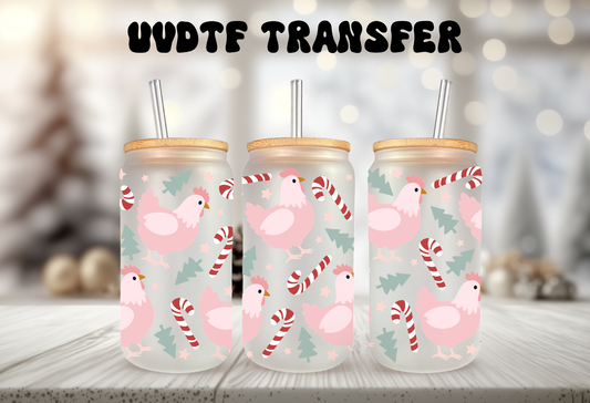 mockup of Three 16oz glass can tumblers with bamboo lids displaying pink Christmas chicken hen UVDTF wrap designs