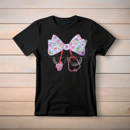 Ready-to-press DTF transfer featuring checkered bow with hearts and faux glitter stethoscope