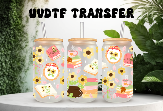 16oz can glass wrap featuring bright yellow sunflowers, stacks of books, and coffee mugs on a clear background.