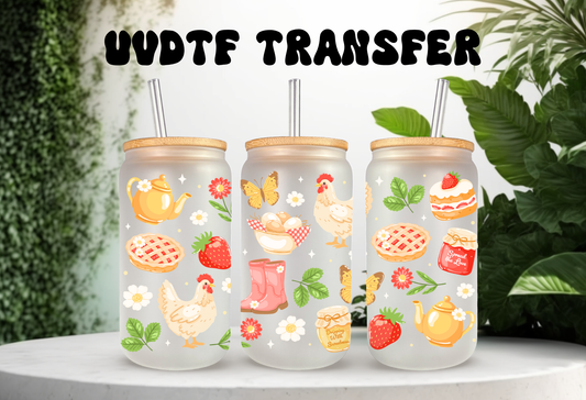 16oz can glass wrap featuring chickens in floral bonnets with strawberries and spring flowers on a clear background.