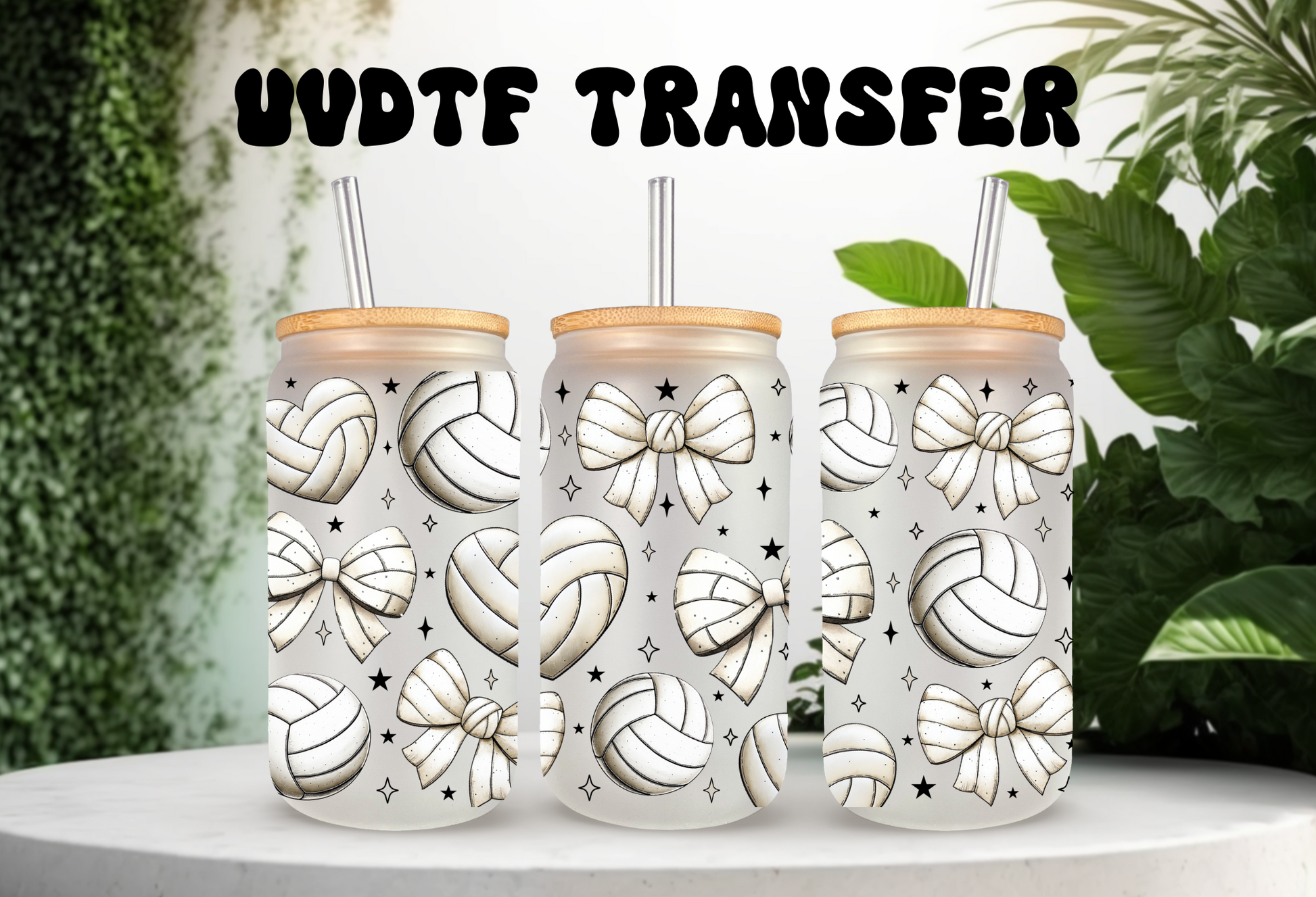Mockup of three 16oz glass cans with bamboo lids featuring a volleyball and cream-colored coquette bow UVDTF wrap design.
