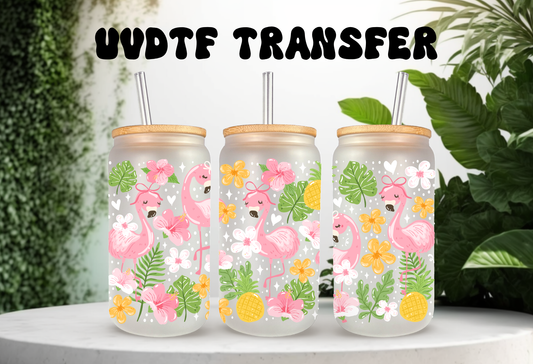 16oz can glass wrap featuring pink flamingos with polka dot bows, tropical pineapples, pink hibiscus, and green palm leaves on a clear background.