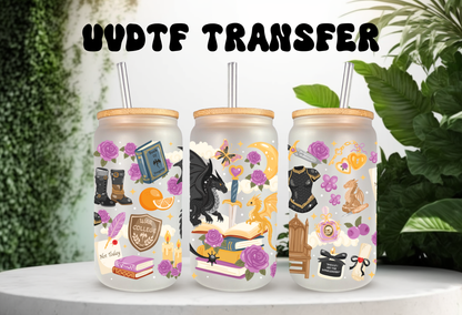 A mockup of three frosted 16oz glass cans with bamboo lids and straws, showcasing UV DTF transfers with bookish themes, dragons, and floral accents against a white background with green leaves