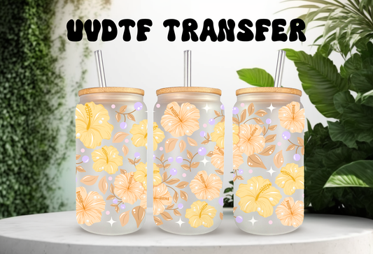16oz can glass wrap featuring yellow hibiscus flowers with orange centers and pink sparkles on a clear background.
