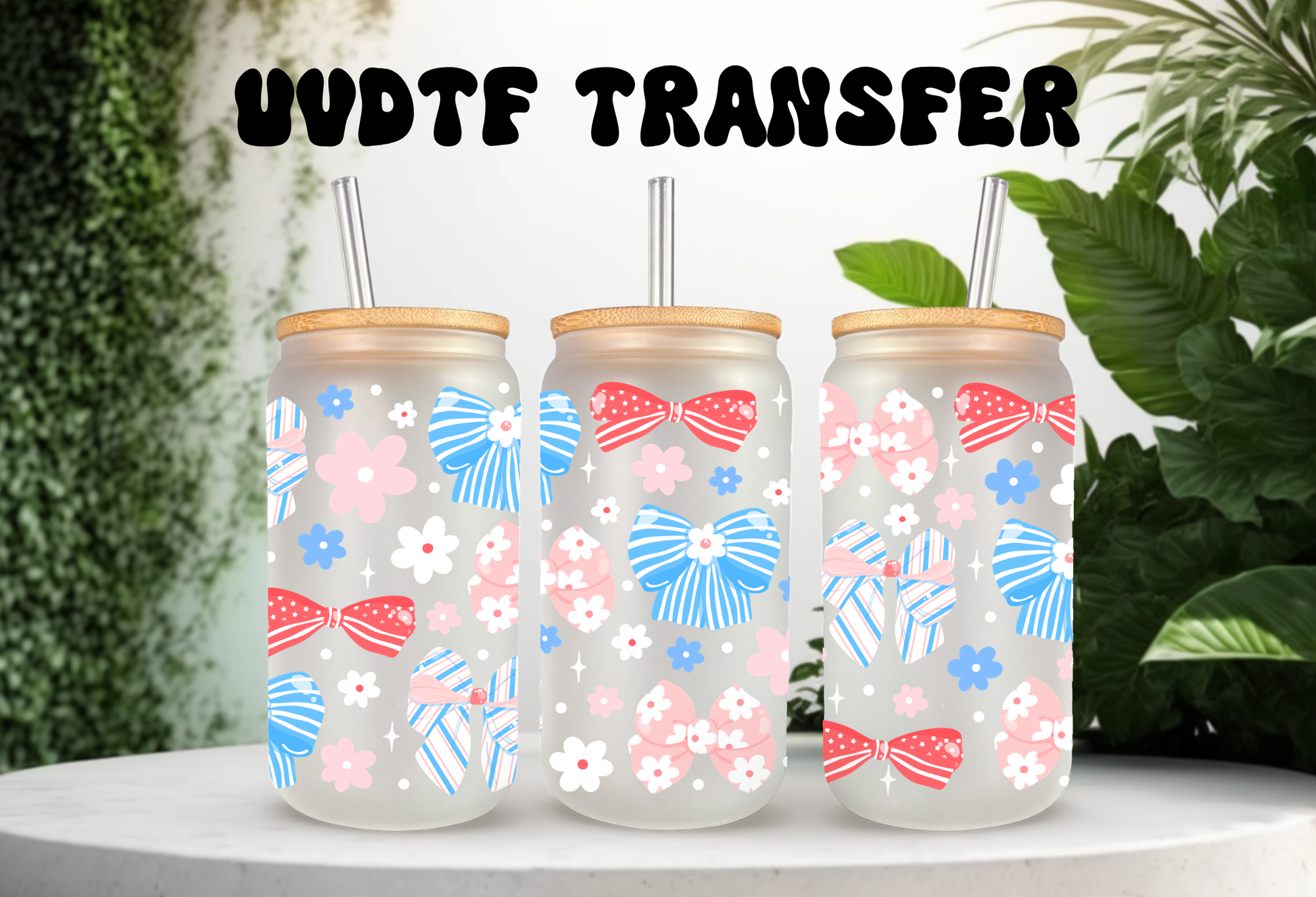 Three frosted 16oz glass cans with bamboo lids and glass straws featuring UVDTF wraps of patriotic coquette bows with stars and stripes, red and blue florals, and butterflies on a white background.