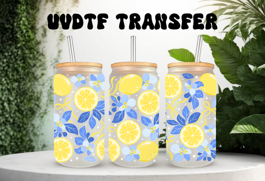 16oz can glass wrap featuring bright yellow lemons, citrus slices, and deep blue floral leaves on a clear background.

