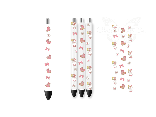 Mockup of pens with pink coquette bow and rain boot UVDTF wraps, 1.5x4.7 inches.