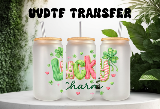 Lucky Charm UV DTF transfer featuring a pink coquette bow and green shamrocks on a 16oz glass can tumbler.