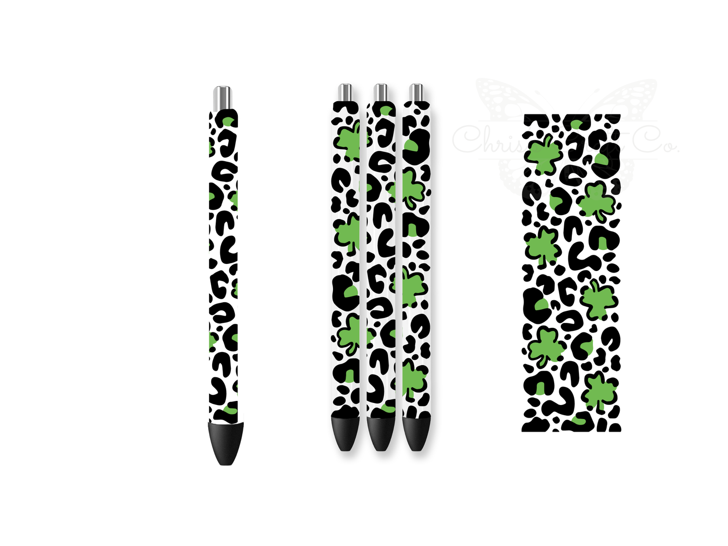 Mockup of four pens featuring green leopard print and shamrock UVDTF wraps next to a flat 1.5x4.7 inch decal design for St. Patrick's Day.