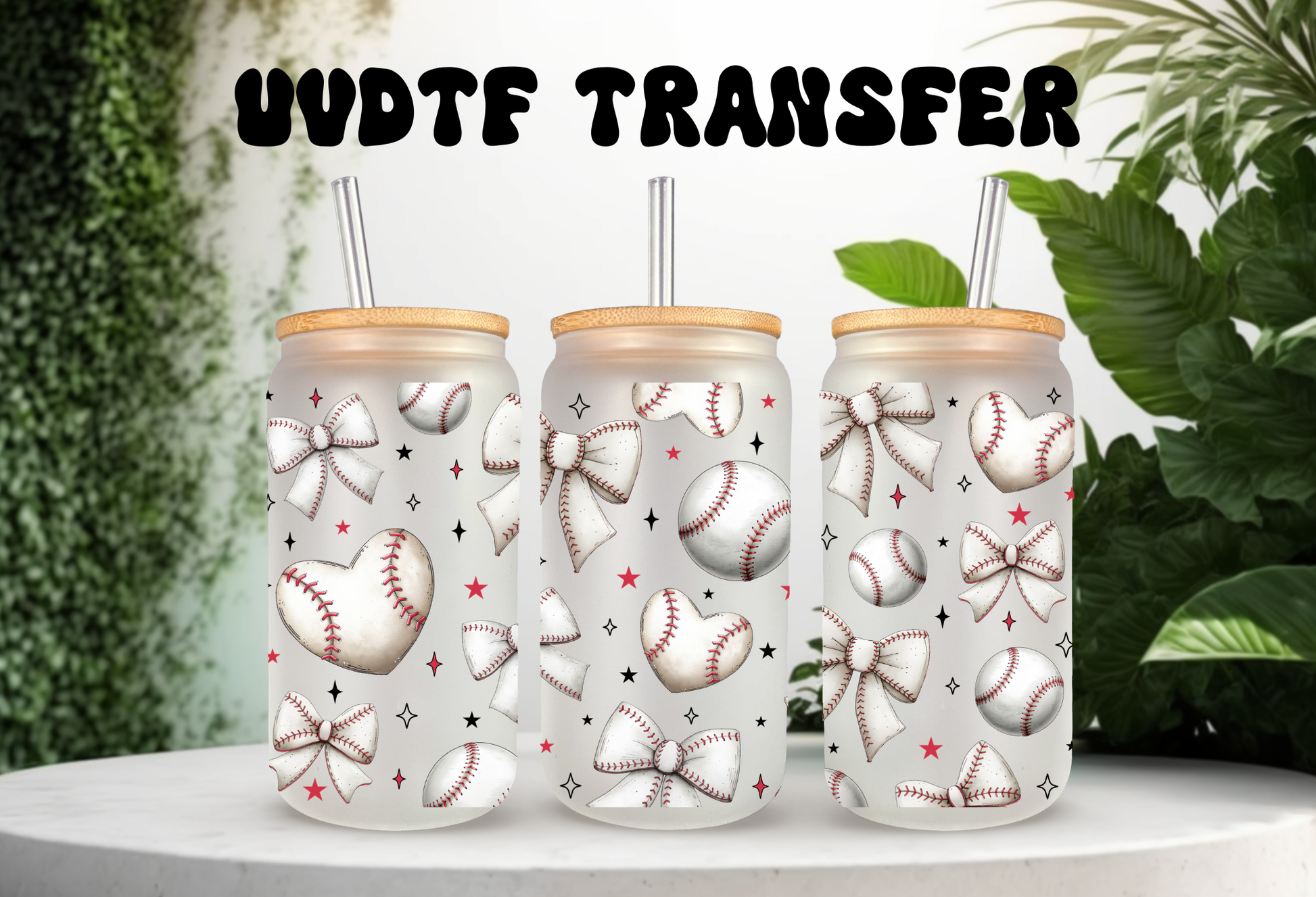 Mockup of three frosted 16oz glass cans featuring a white coquette bow and baseball pattern UVDTF wrap, styled with bamboo lids and glass straws.