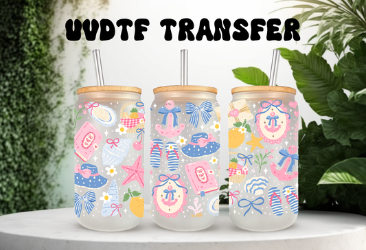 16oz can glass wrap featuring a pastel coastal design with pink and blue coquette bows, beach umbrellas, a vintage radio, and a Stay Salty motel key tag.