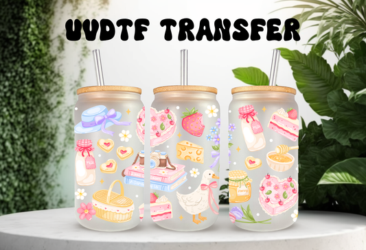 16oz can glass wrap featuring a white goose in a floral bonnet with strawberry shortcake, books, and heart cookies on a clear background.