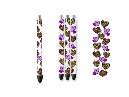 A UV DTF pen wrap transfer featuring a vertical row of hearts with alternating designs of solid purple and leopard print patterns, shown with a 3D glossy finish on white pens.