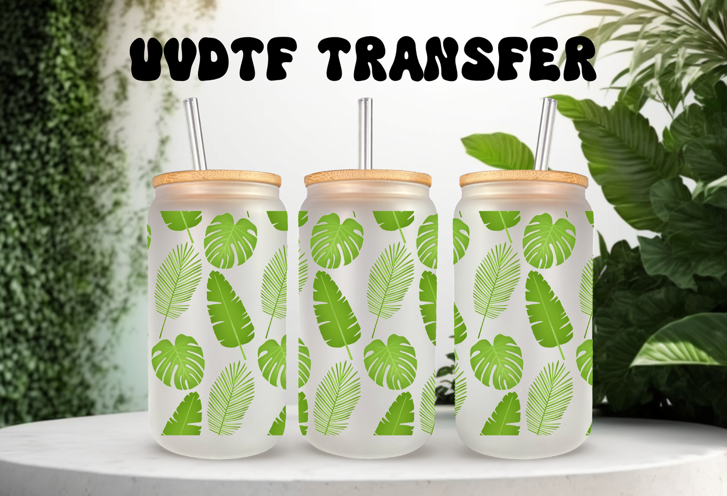 16oz frosted can glass wrap featuring a vibrant green botanical design with detailed monstera leaves and tropical palm fronds on a clear background.
