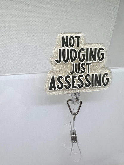 Funny Glitter Badge Reel – 'Not Judging, Just Assessing' Cloud Design with Retractable ID Holder