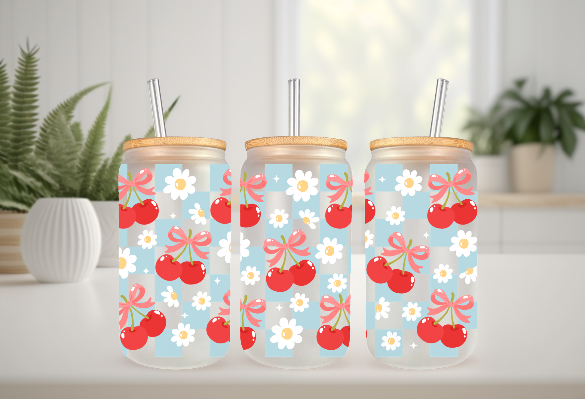 MOCKUP OF A 16oz can glass wrap featuring a trendy summer design with bright red cherries and red coquette bows over a light blue and white checkered background.
