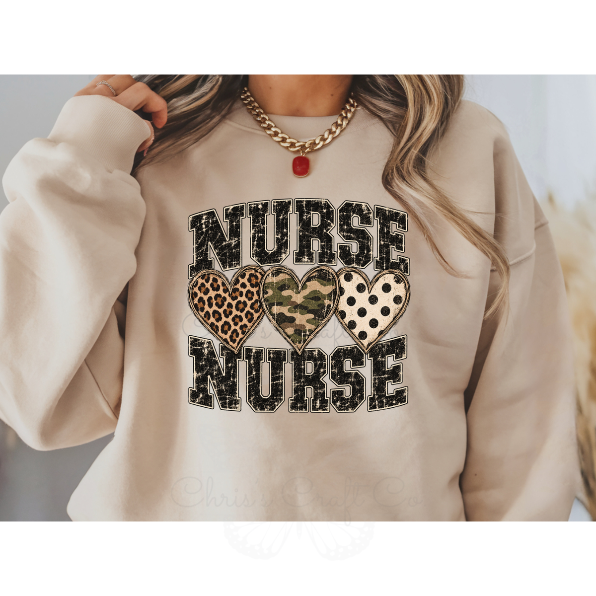 Sweatshirt mockup featuring a Nurse DTF transfer with leopard print, camo, and polka dot hearts