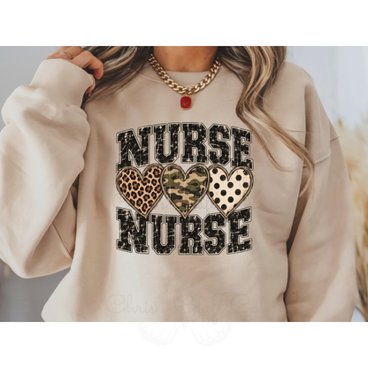Sweatshirt mockup featuring a Nurse DTF transfer with leopard print, camo, and polka dot hearts