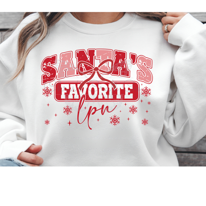 Grey t-shirt mockup featuring a Santa's Favorite LPN DTF transfer with red and pink glitter text and snowflakes.