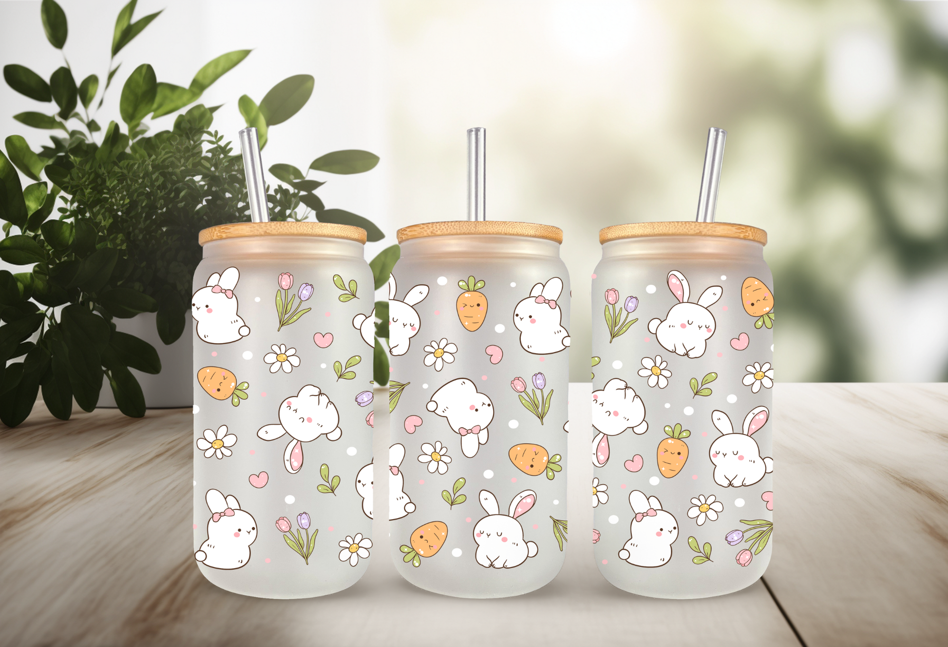 Product mockup of three 16oz glass cans featuring a Retro Bunny and Carrots UVDTF wrap with white bunnies, orange carrots, and spring flowers