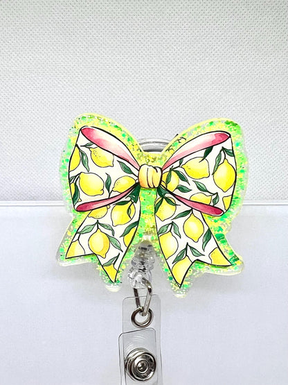 Lemon Bow Badge Reel – Glittery Yellow and Green Design with Red Ribbon Accent for ID Holders