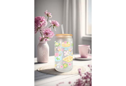 Mockup of three frosted glass cans with floral and hobby-themed UVDTF transfers, including bookish and crafty designs.