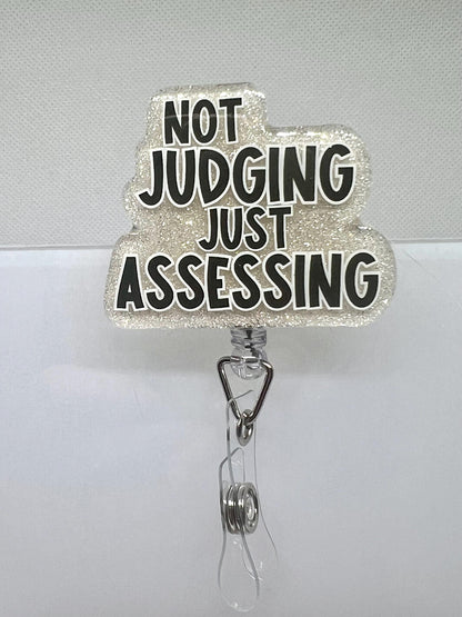 Funny Glitter Badge Reel – 'Not Judging, Just Assessing' Cloud Design with Retractable ID Holder