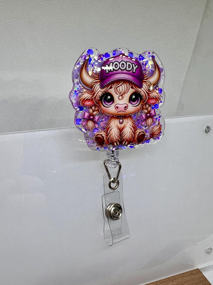 Highland Cow Badge Reel – Glittery 'Moody' Purple Hat Design with Retractable ID Holder