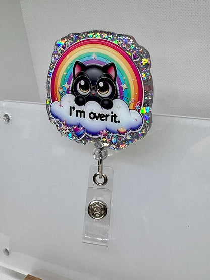 Cute Cat Badge Reel – 'I'm Over It' Rainbow and Cloud Design for Fun and Whimsical ID Holder