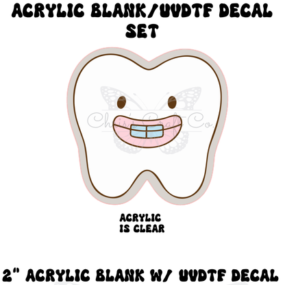  mockup of a 2-inch clear acrylic tooth-shaped blank with a permanent UVDTF decal featuring a smiling cartoon tooth wearing a pink coquette bow.

