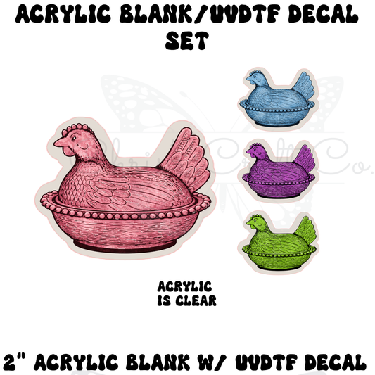 2 inch clear acrylic blank with a vintage hen on nest bowl UVDTF decal in pink, purple, blue, and green.