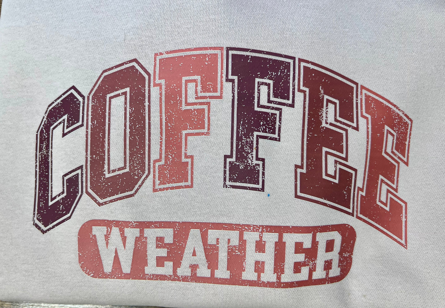 Distressed retro Coffee Weather DTF transfer in warm beige and brown tones, ready-to-press heat transfer for coffee-themed apparel.