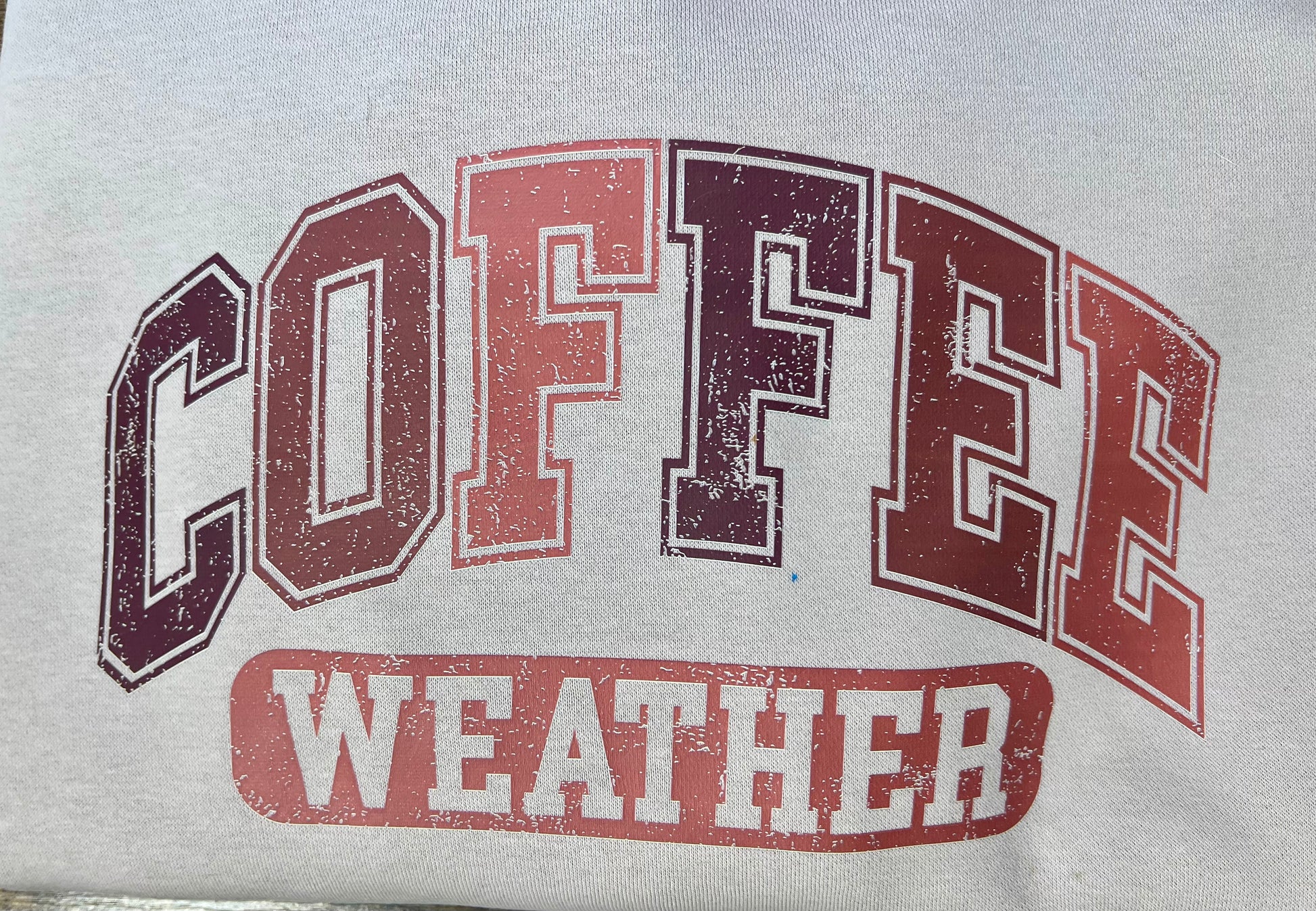 Distressed retro Coffee Weather DTF transfer in warm beige and brown tones, ready-to-press heat transfer for coffee-themed apparel.