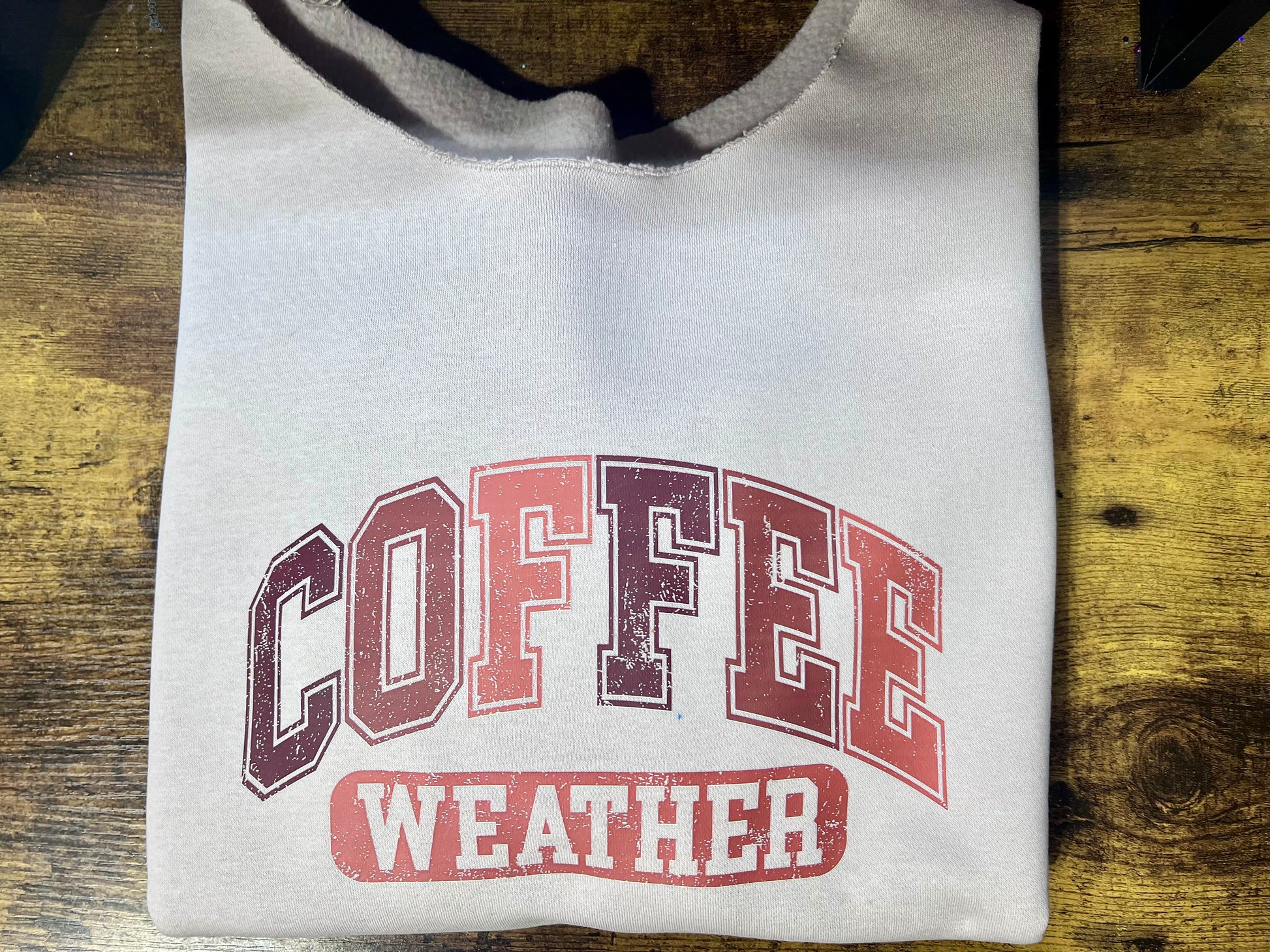 Distressed retro Coffee Weather DTF transfer in warm beige and brown tones, ready-to-press heat transfer for coffee-themed apparel.